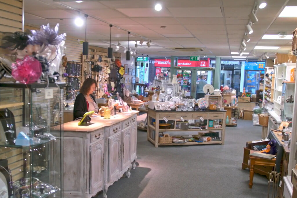 Tracy on the till of the love it again shop