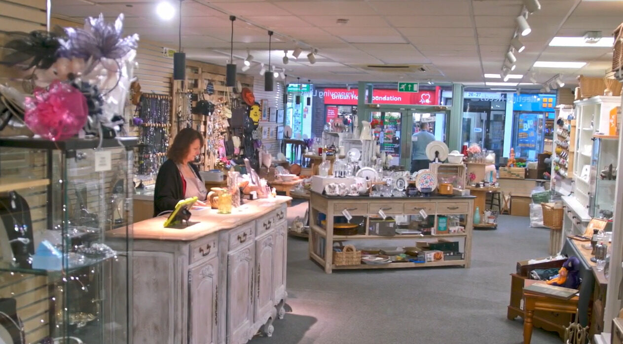 Tracy on the till of the love it again shop